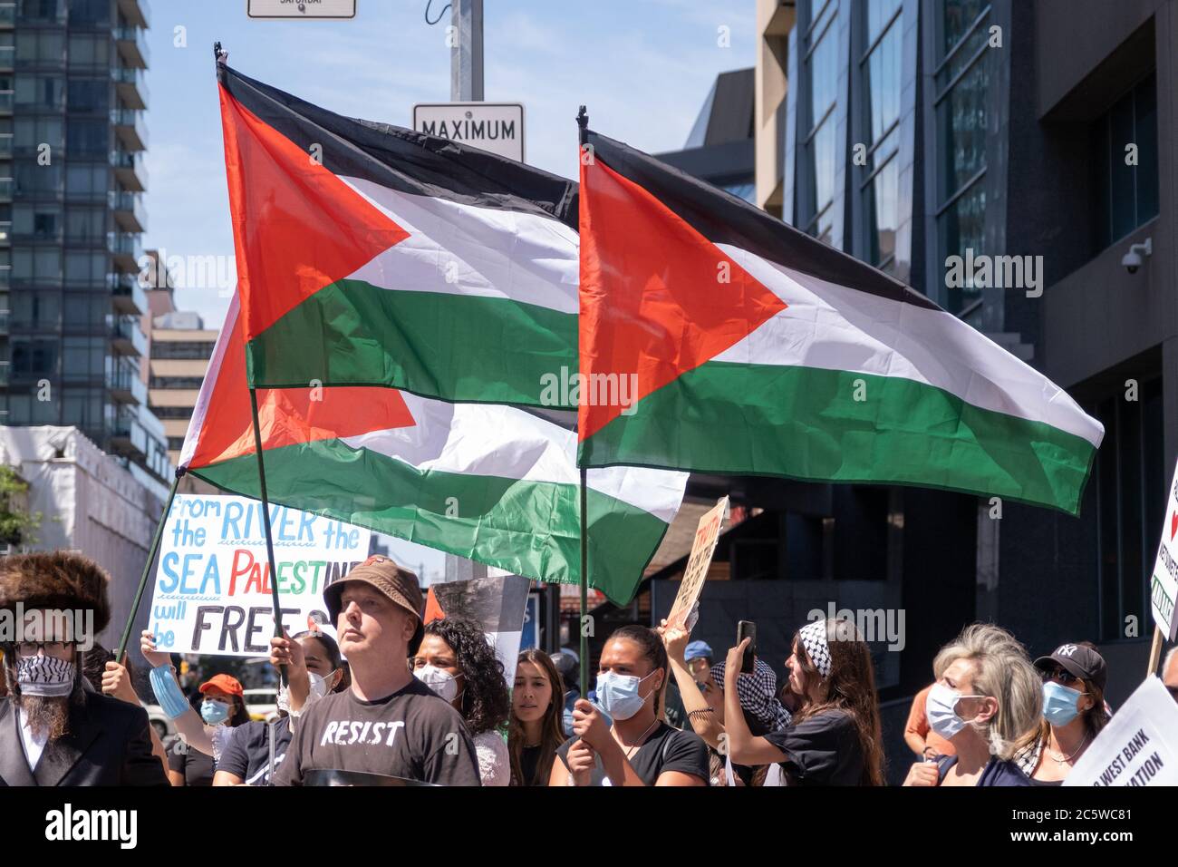 Protesters denounce Israel in support of Palestine at the 'Day of Rage' protest in Toronto, Ontario. Stock Photo