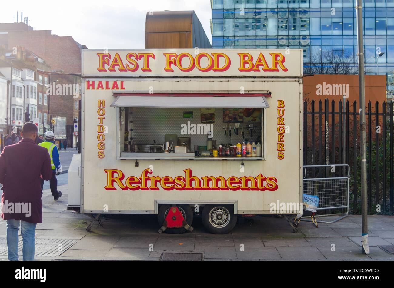 A trailer with a kitchen for selling fast foods with "Fast food bar