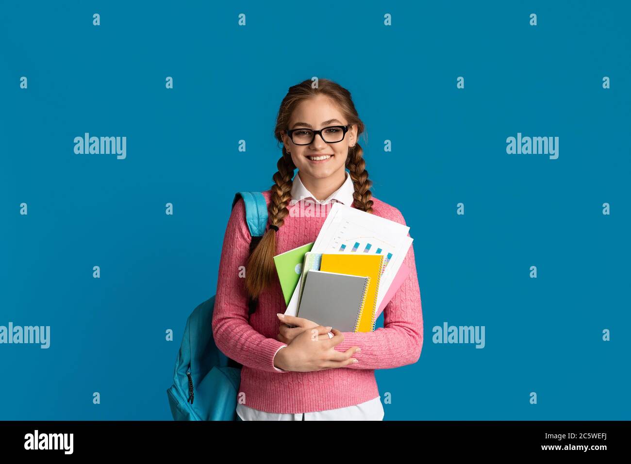 Modern student concept. Girl teenager with notebooks Stock Photo