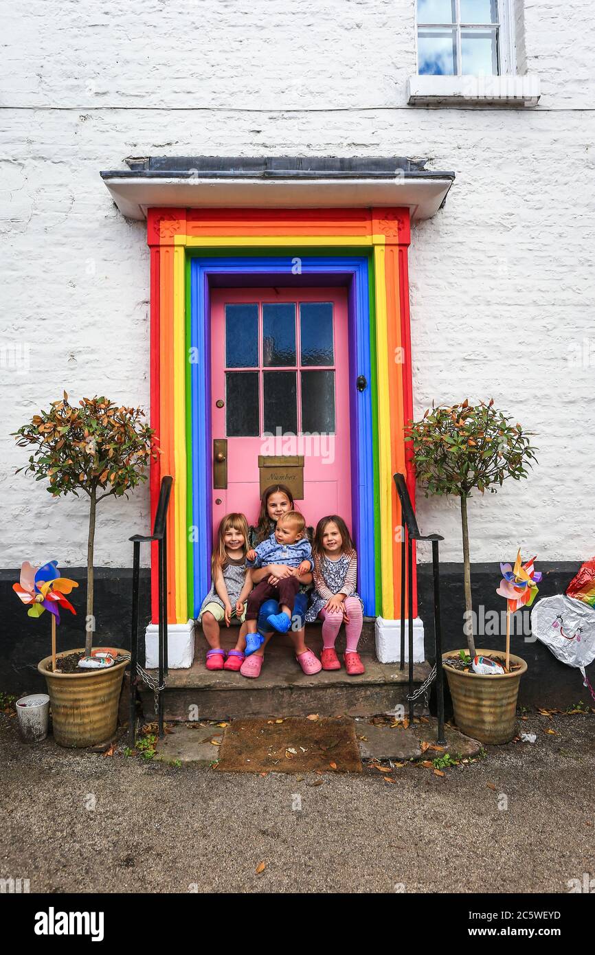 Bewdley, Worcestershire, UK. 5th July, 2020. A family who have painted their Bewdley house front door portico in rainbow colours to honour the NHS over the lockdown have been told by their local council they must remove the painted part it by September 7th. Originally, the council ordered the removal immediately after just one person complained. On the day of 72 years of the NHS, the family - Giles and Sara Hemmings and their four children - are holding a charity 'goodbye rainbow door' cake sale. Peter Lopeman/Alamy Live News Stock Photo