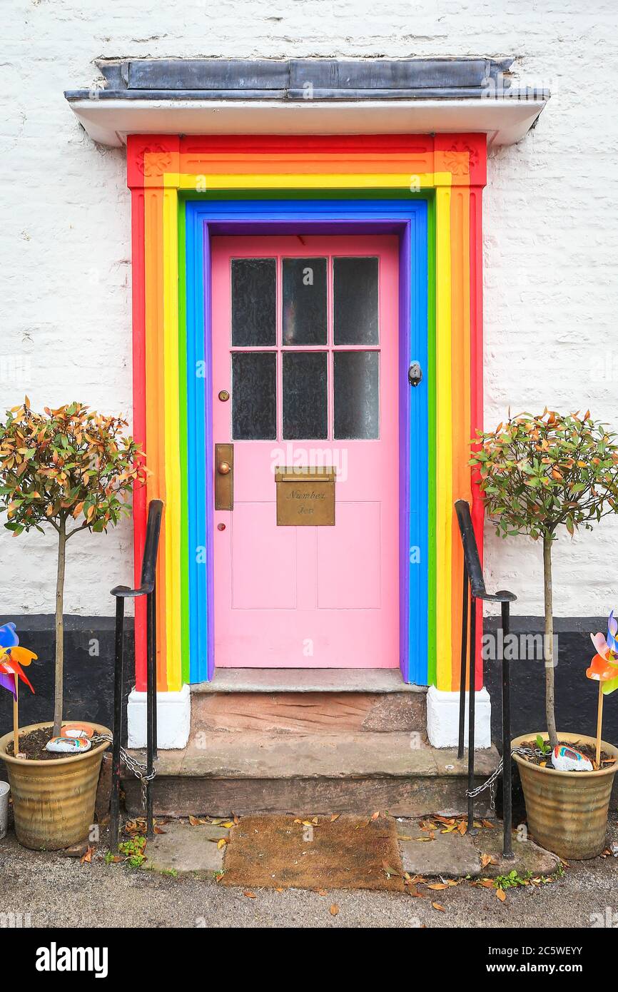 Bewdley, Worcestershire, UK. 5th July, 2020. A family who have painted their Bewdley house front door portico in rainbow colours to honour the NHS over the lockdown have been told by their local council they must remove the painted part it by September 7th. Originally, the council ordered the removal immediately after just one person complained. On the day of 72 years of the NHS, the family - Giles and Sara Hemmings and their four children - are holding a charity 'goodbye rainbow door' cake sale. Peter Lopeman/Alamy Live News Stock Photo