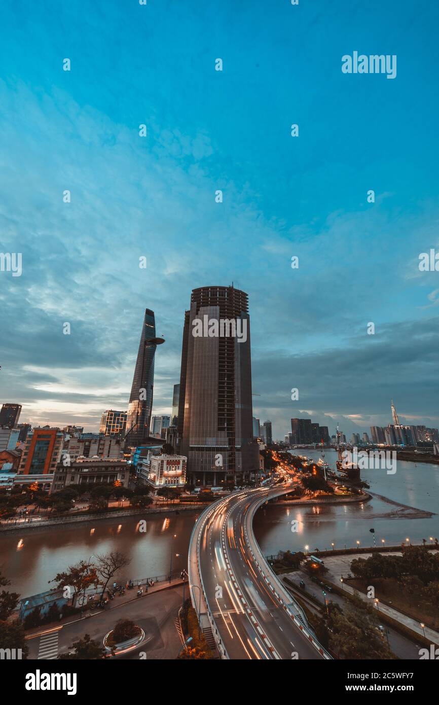 SAIGON, VIETNAM JULY 04, 2020 Ho Chi Minh city at night, Khanh Hoi bridge, yellow trail on