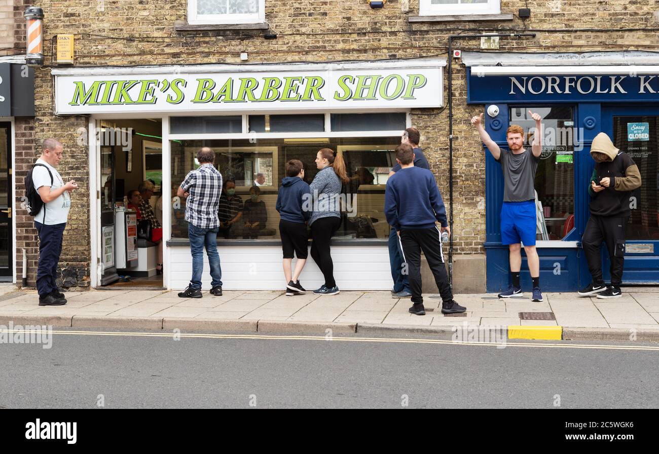 Queue wait at barbers for haircut after Covid19 lockdown is eased