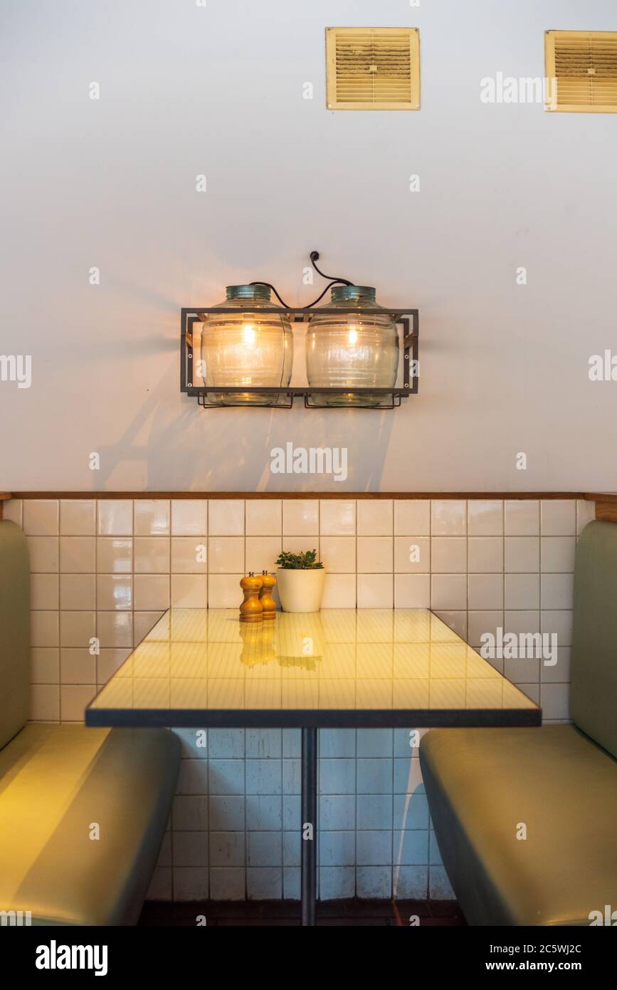 A table in a rustic and vintage stylish cafe Stock Photo