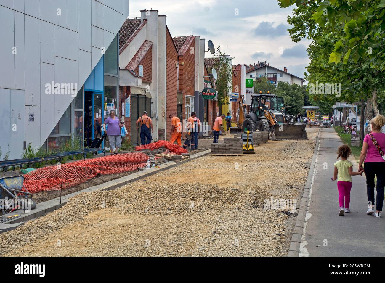 Zrenjanin, Serbia, July 04, 2020. Works on the installation of a new sidewalk in the settlement of Bagljas in the town of Zrenjanin. Works are current Stock Photo
