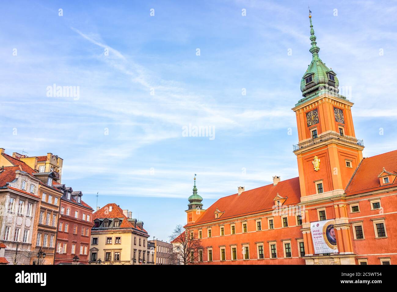 Warsaw, Poland - December 19, 2019: Old town Warszawa Christmas historic famous Castle Square with red building in capital city during winter sunset a Stock Photo