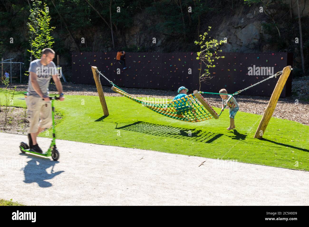 Children playing at playground 'Lover Alpin Park' , Sopron, Hungary Stock Photo