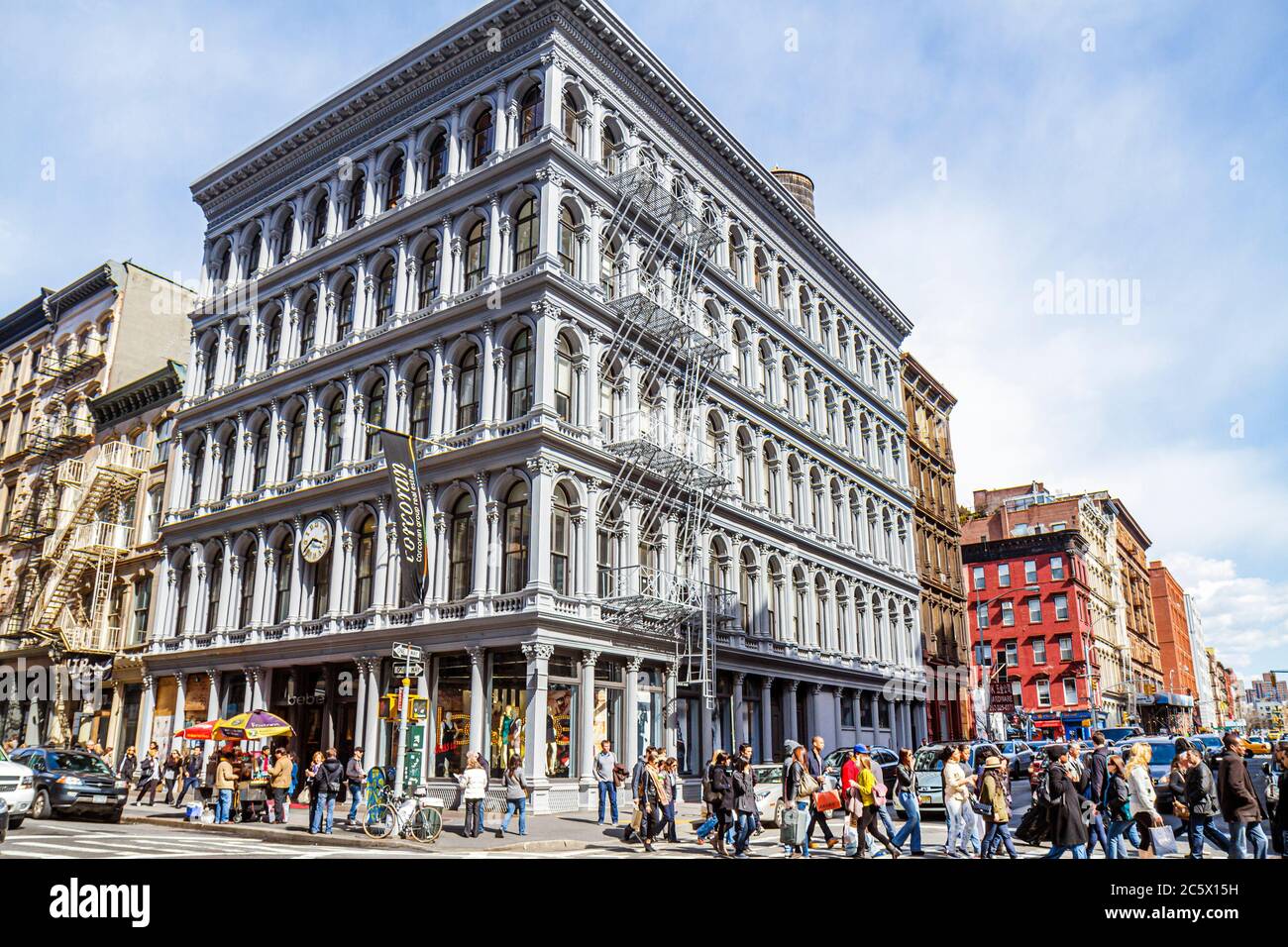 New York,New York City,NYC,Lower,Manhattan,SoHo,Cast Iron Historic District,architecture,architectural,Broome Street,Broadway,Haughwout building,crowd Stock Photo