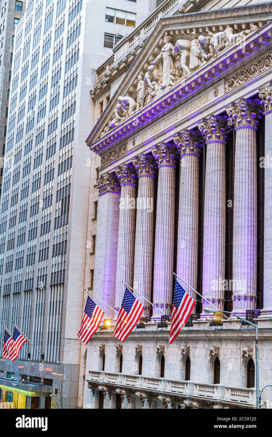 New York,New York City,NYC,Lower,Manhattan,Financial District,FiDi,Broad Street,Wall Street,New York Stock exchange,shop,NYSE,illuminated facade,pedim Stock Photo