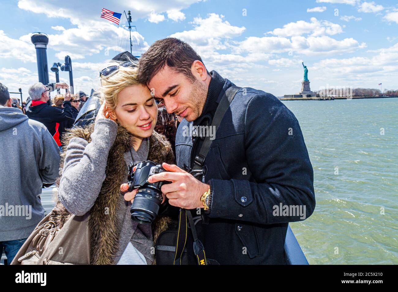 New York City,NYC NY Upper Bay,Statue Cruises,Liberty Island,Statue of Liberty,National Monument,man men male adult adults,woman female women,couple,y Stock Photo