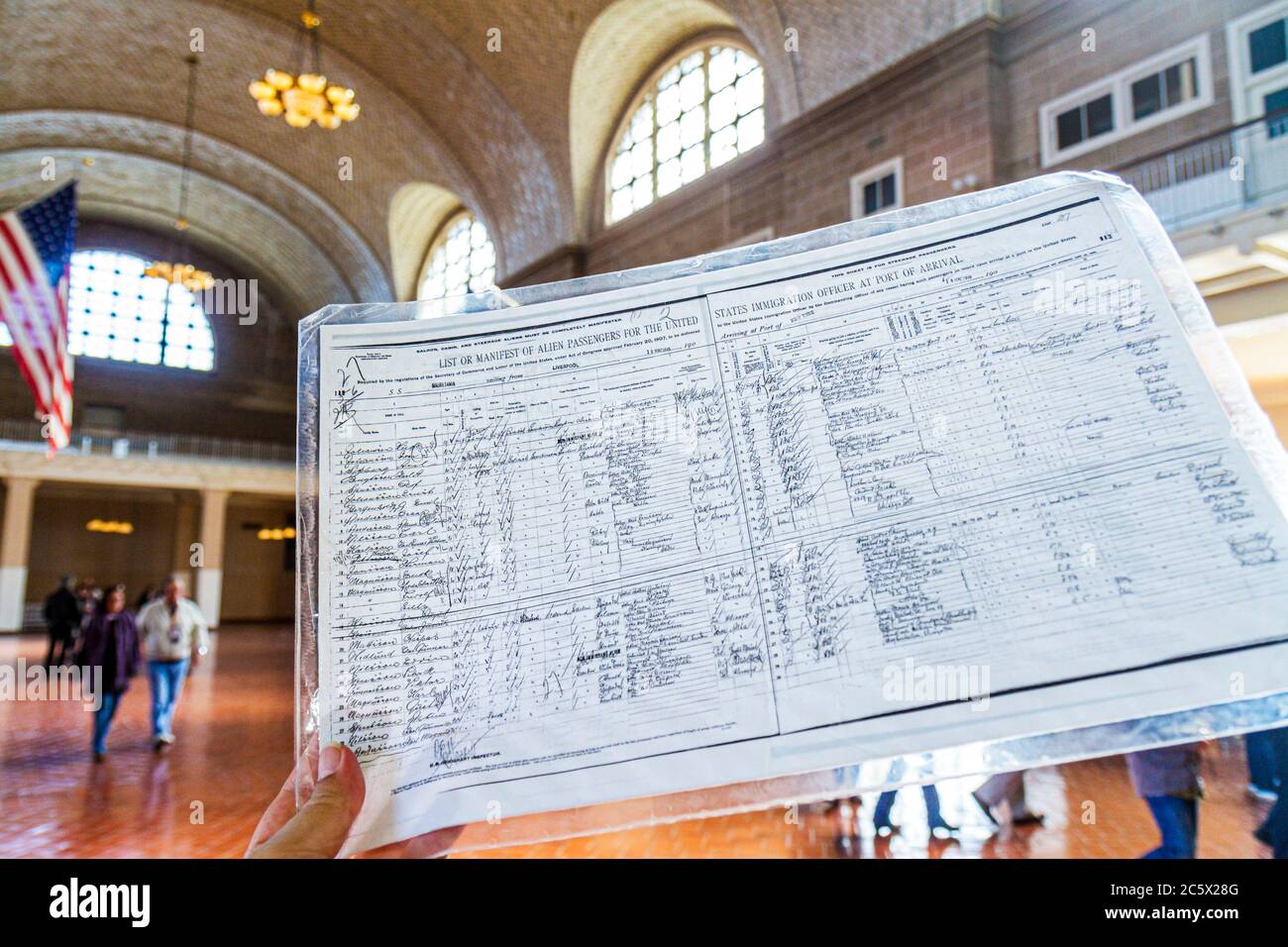 New York City,NYC NY Statue of Liberty National Monument,Ellis Island Immigration Museum,historic site,Great Hall,processing desk,passenger manifest d Stock Photo