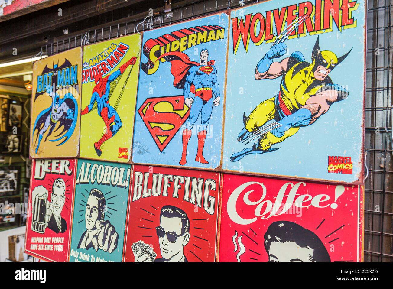 New York City,Manhattan,Mulberry Street,Little Italy,store display sale comic book super heroes characters Wolverine Superman Spiderman Batman signs Stock Photo
