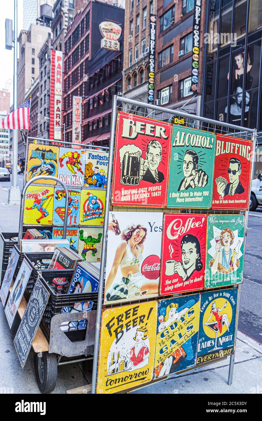 New York City,NYC NY Midtown,Manhattan,44th Street,street,vendor vendors stall stalls booth market marketplace,vintage signs,ads,shopping shopper shop Stock Photo