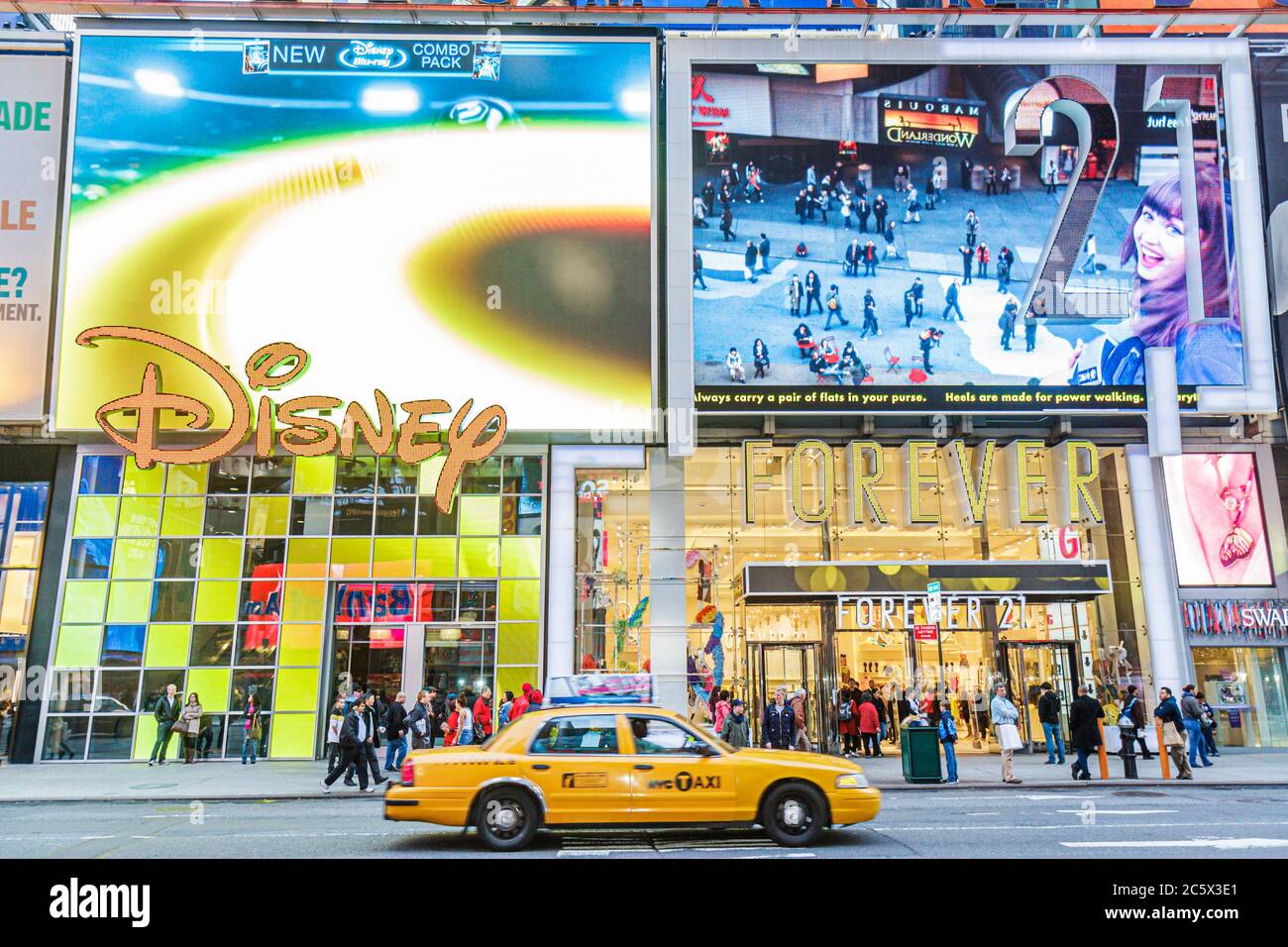 New York City,NYC NY Midtown,Manhattan,Times Square,Theatre District,illuminated sign,animated LED,Disney,Forever 21,store,stores,businesses,district, Stock Photo