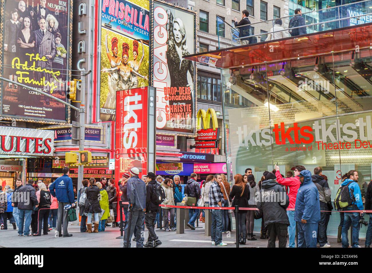 New York City,NYC NY Midtown,Manhattan,Times Square,Theatre District,Broadway,illuminated sign,spectaculars,ad,Chicago,Addams,family families parent p Stock Photo