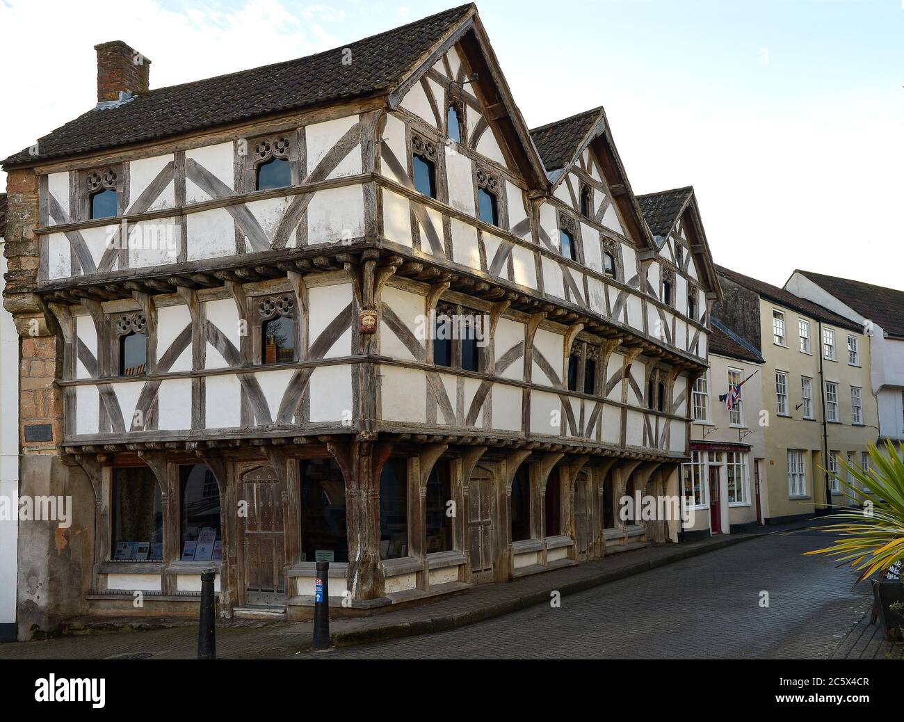 Early English timber frame building.  Formerly wool merchants and medieval shops.  This building built in 1460 on site of a former building built 1340. Stock Photo