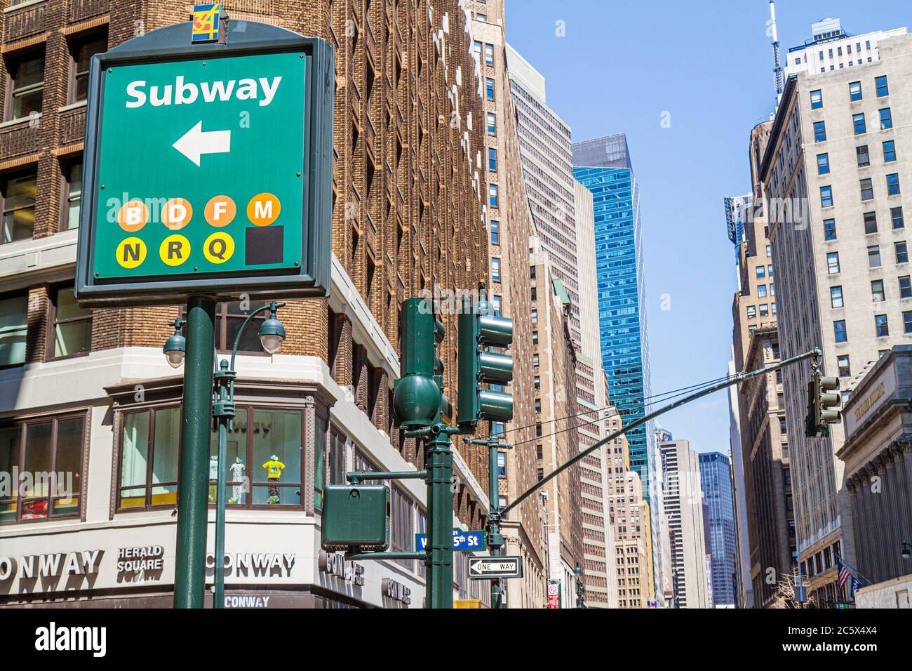 New York,New York City,NYC,Manhattan,Midtown,35th Street,Broadway,Herald Square,MTA New York Subway system,sign,logo,direction,buildings,city skyline Stock Photo