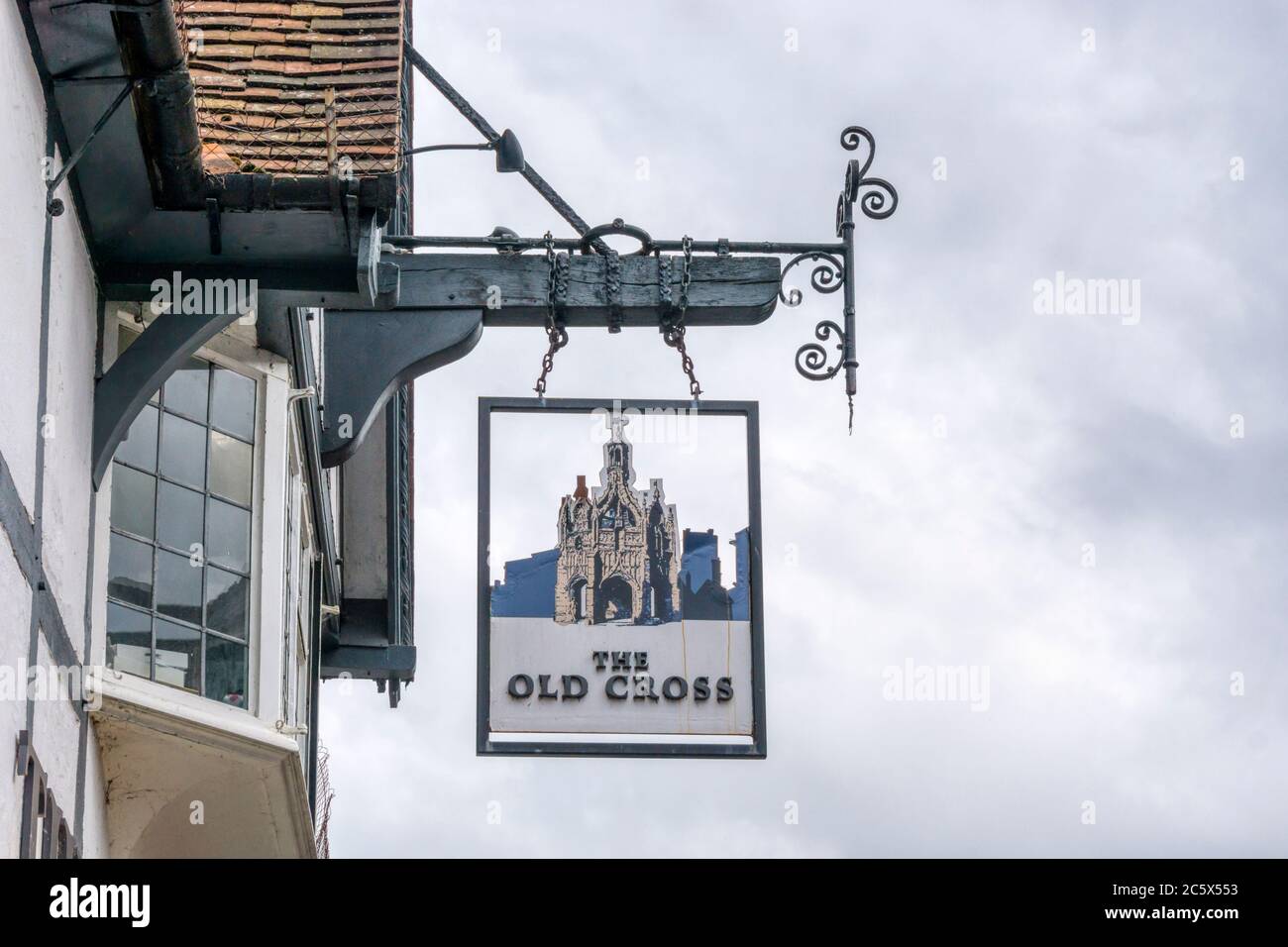 Pub sign for The Old Cross in North Street, Chichester shows the town's Market Cross. Stock Photo