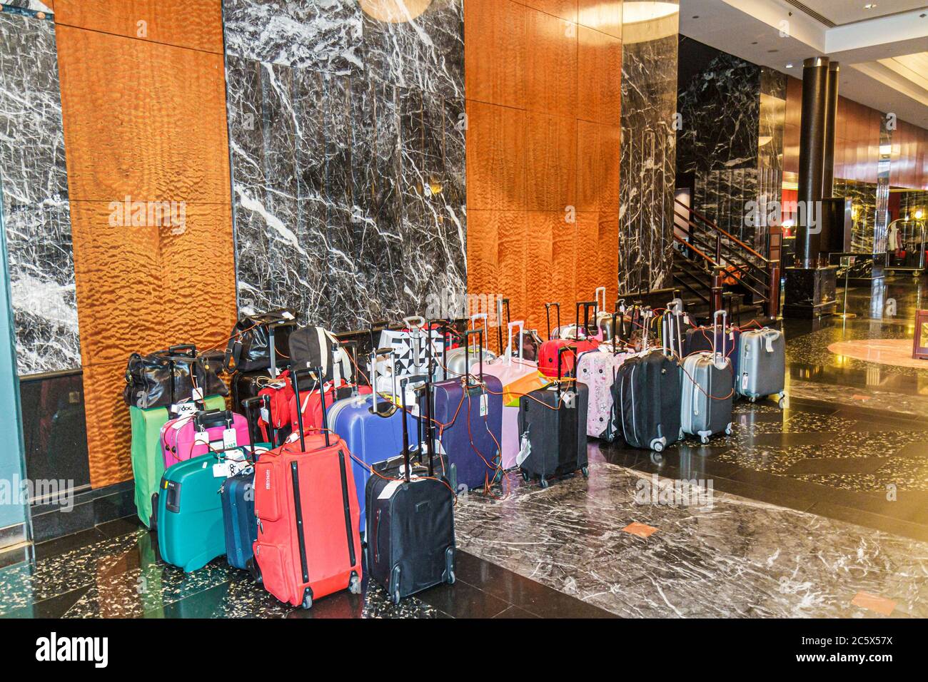 New York City,NYC NY Manhattan,Midtown,Millennium Broadway Hotel New York,chain,hospitality,guest service,lobby,luggage,suitcase storage,chained,NY110 Stock Photo