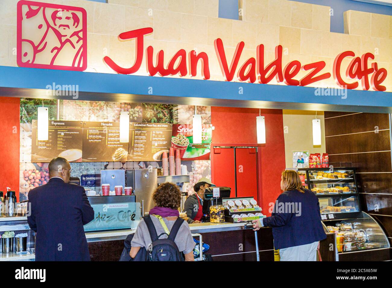 New York City,NYC NY Brooklyn,John F. Kennedy International Airport,JFK,Juan Valdez Cafe,coffee shop,counter,Black man men male adult adults,woman fem Stock Photo