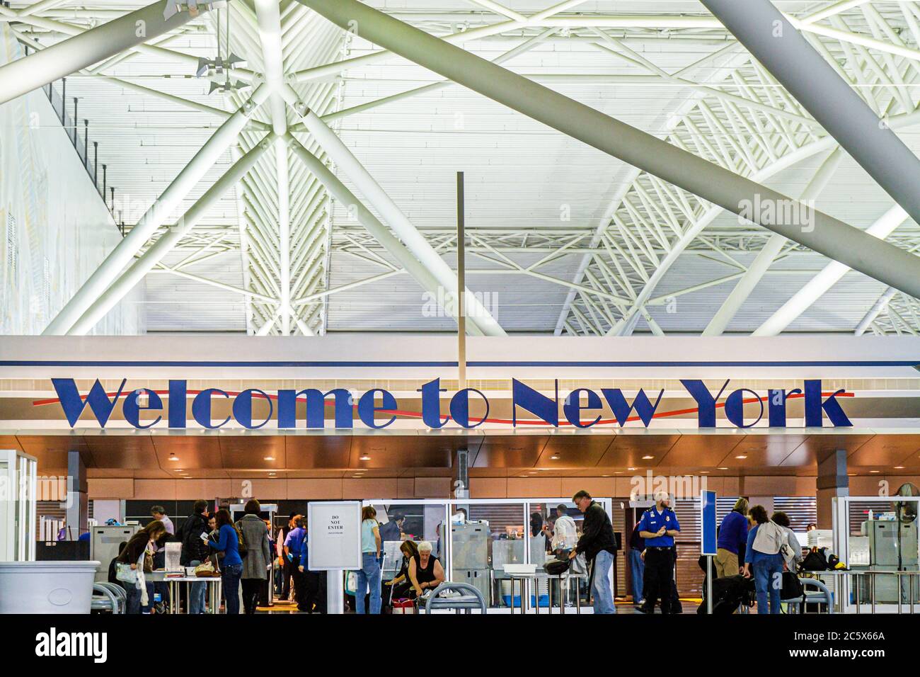 New York City,NYC NY Brooklyn,John F. Kennedy International Airport,JFK,American Airlines,welcome,sign,terminal,structure beam,homeland security,check Stock Photo