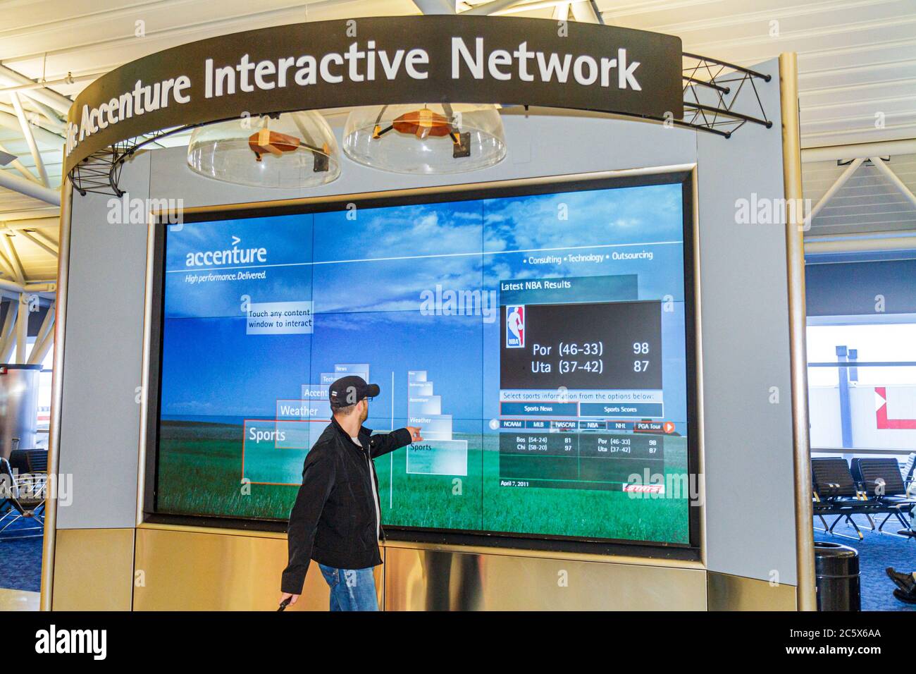 New York City,NYC NY Brooklyn,John F. Kennedy International Airport,JFK,Accenture Interactive Network,touch screen display sale on demand news,sports, Stock Photo