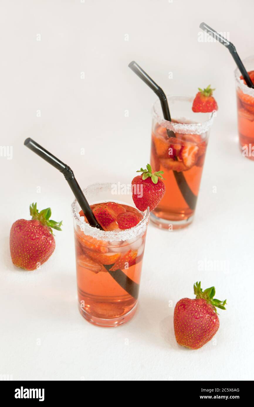 Mexican Strawberry Water - Agua de Fresa. closeup of fresh strawberry water fruit and strawberry juice isolated in white background. Stock Photo