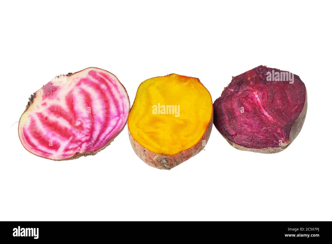Mix of yellow and Chioggia beets on white background Stock Photo