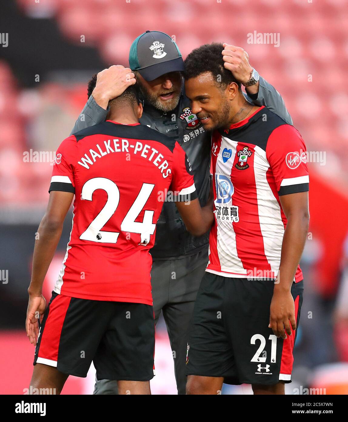 Southampton manager Ralph Hasenhuttl celebrates with Kyle Walker-Peters and Ryan Bertrand after the Premier League match at St Mary's Stadium, Southampton. Stock Photo