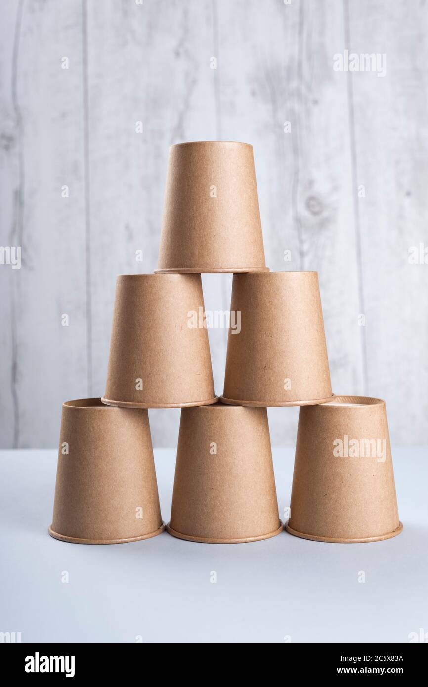 https://c8.alamy.com/comp/2C5X83A/coffee-cups-pyramid-isolated-on-light-background-2C5X83A.jpg