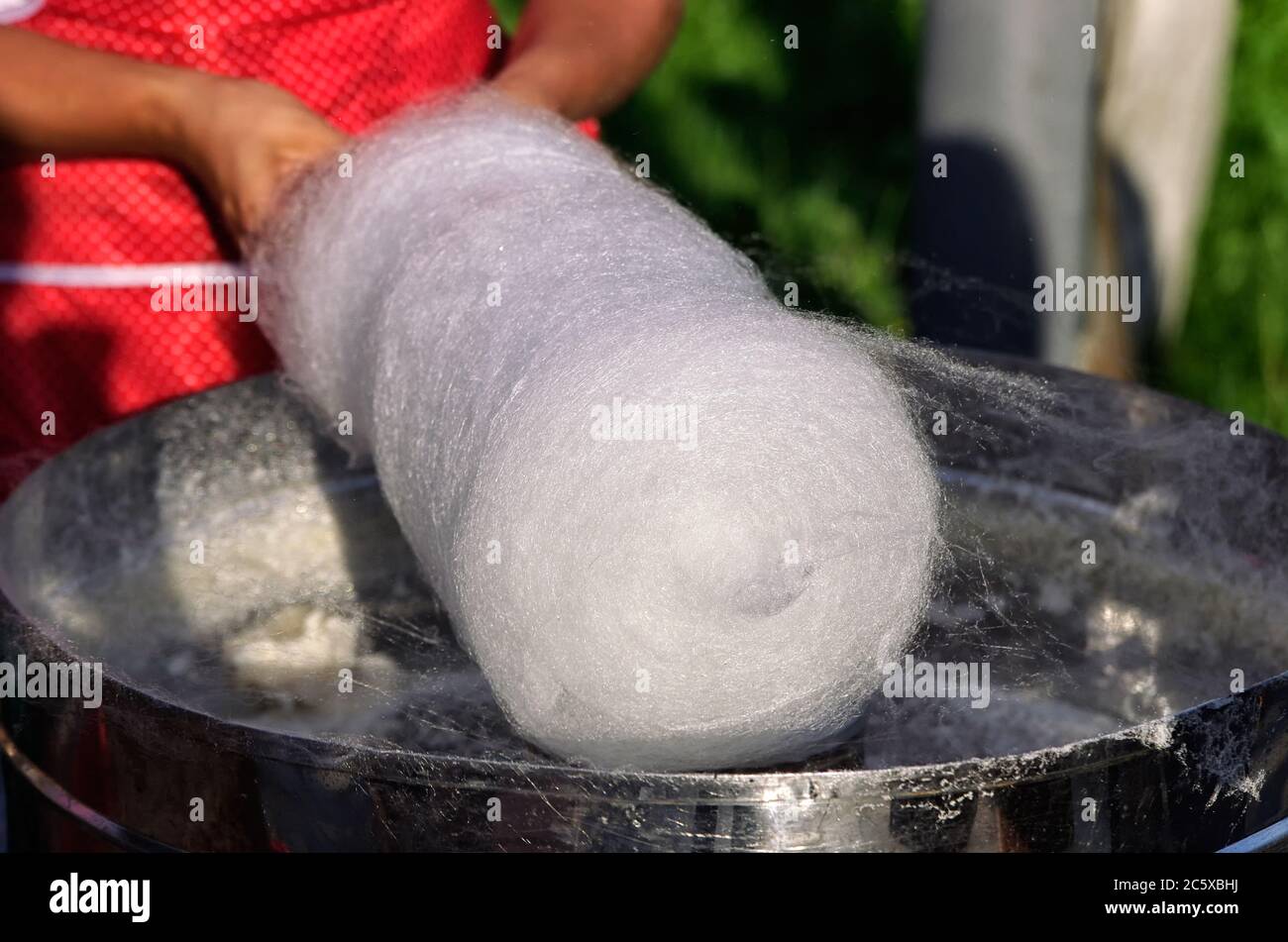 Spinning white sugar candy floss Stock Photo Alamy