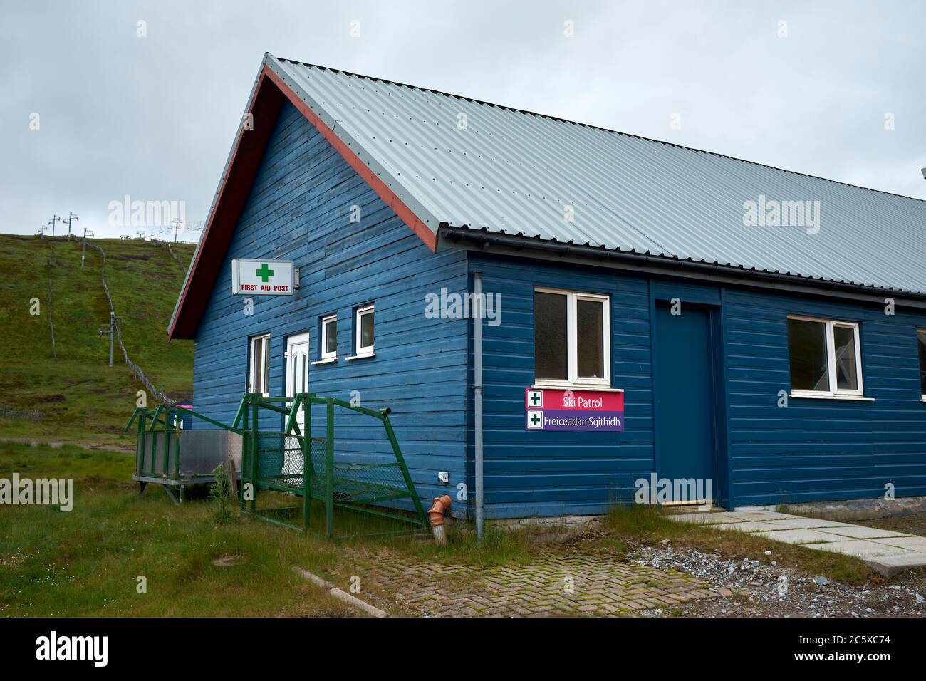 Waiting for winter, during a rainy July and out of season, the Ski Patrol and First Aid Centre is closed at the Lecht Ski Centre Stock Photo