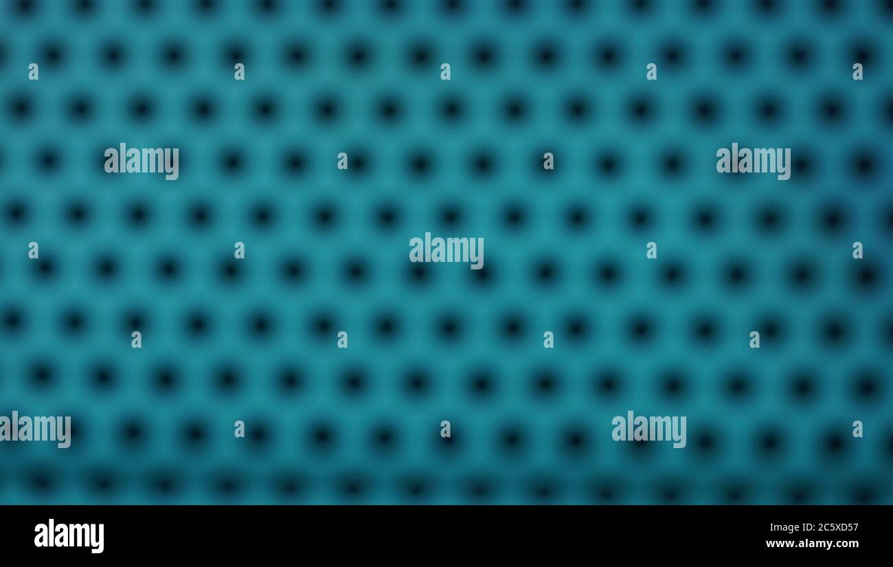 Blurred turquoise metal background with black holes, metal mesh Stock Photo