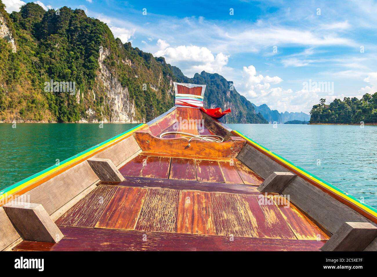 Wooden thai traditional long tail boat on Cheow Lan lake, Ratchaprapha