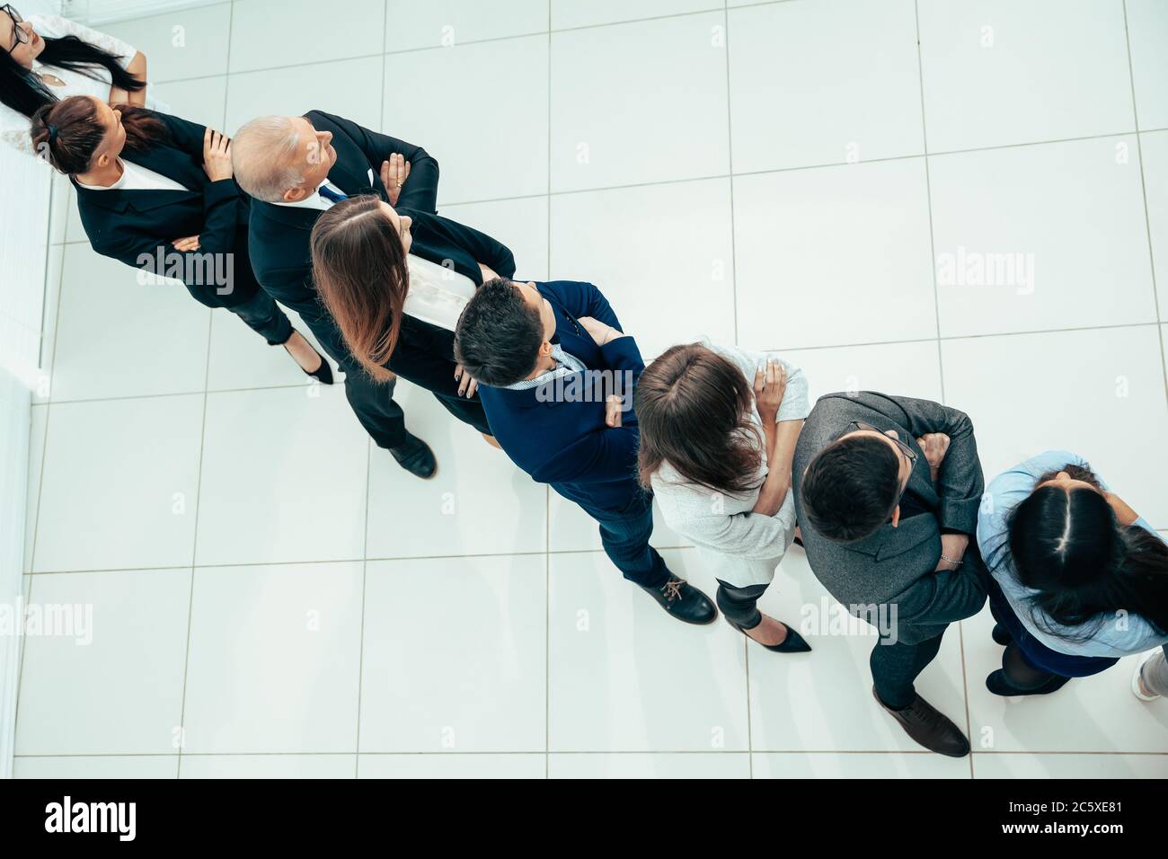 group of confident business people standing in a row Stock Photo - Alamy