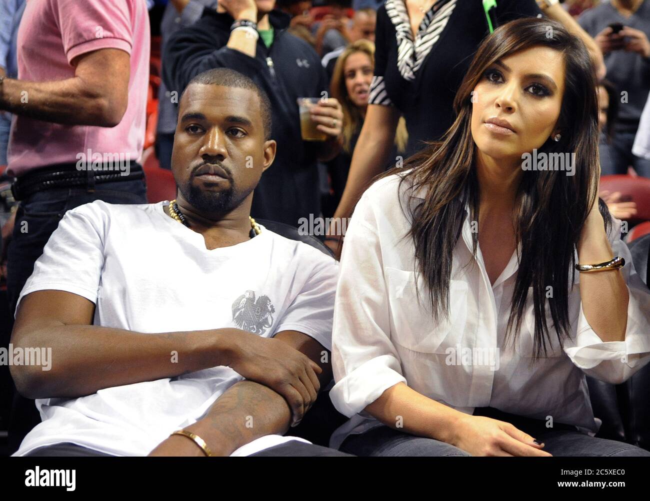 MIAMI FL DECEMBER 06 Kanye West and Kim Kardashian attend the game between the New York Knicks and Miami Heat at American Airlines Arena on December 6 2012 in Miami Florida
