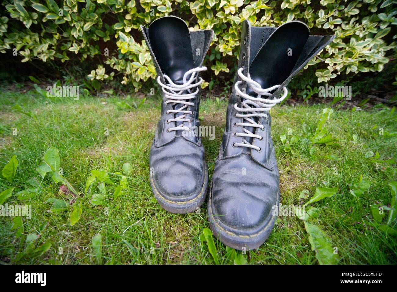 Black Dr Martens, Doc Martens, DM boots 10 eyelet 8 inch size, original made  in England Airwair soles, rugged, style, fashion, outerwear, shoes, UK  Stock Photo - Alamy