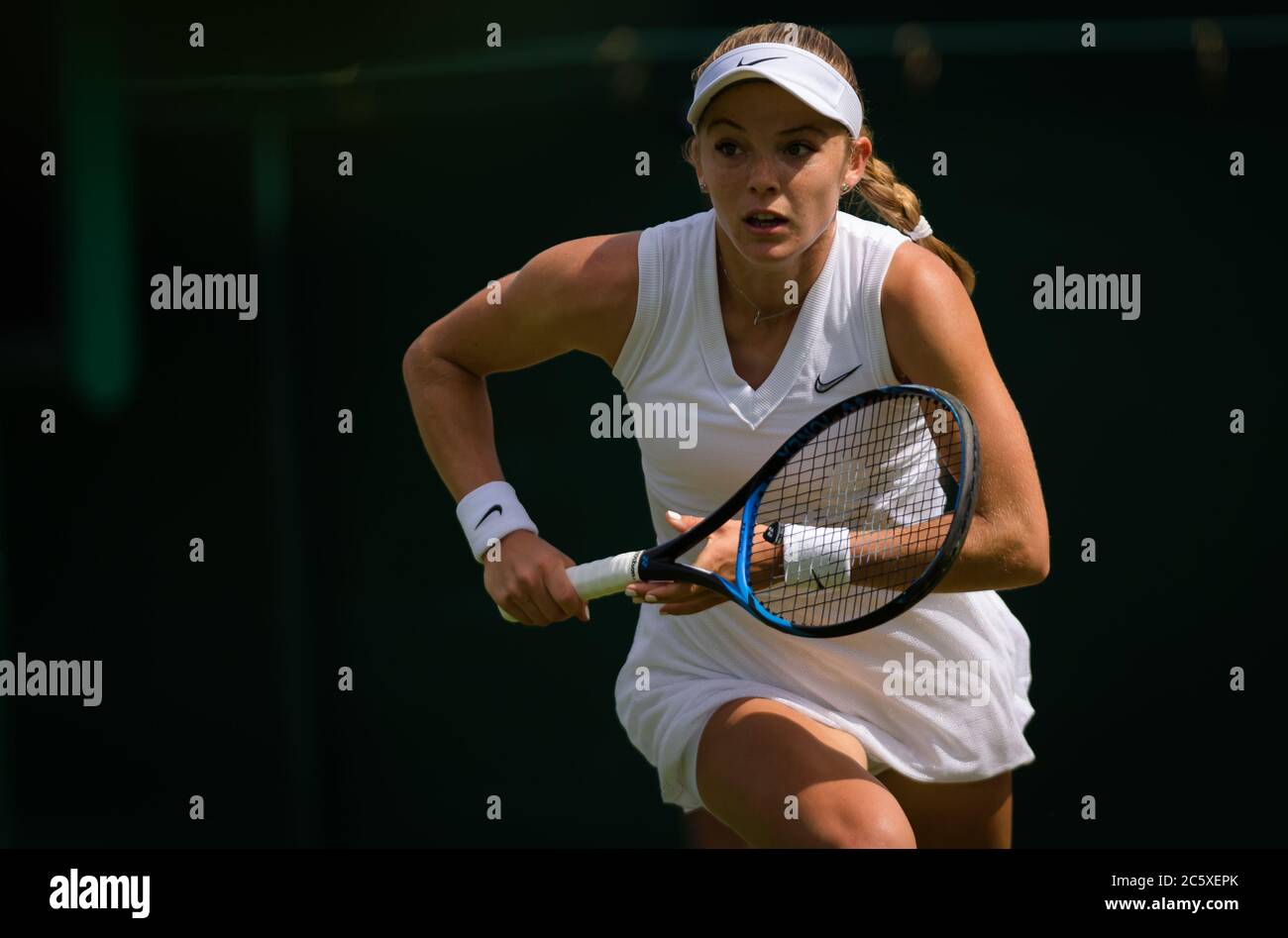 Katie Swan of Great Britain in action during her first-round match at the 2019 Wimbledon Championships Grand Slam Tennis Tournament Stock Photo