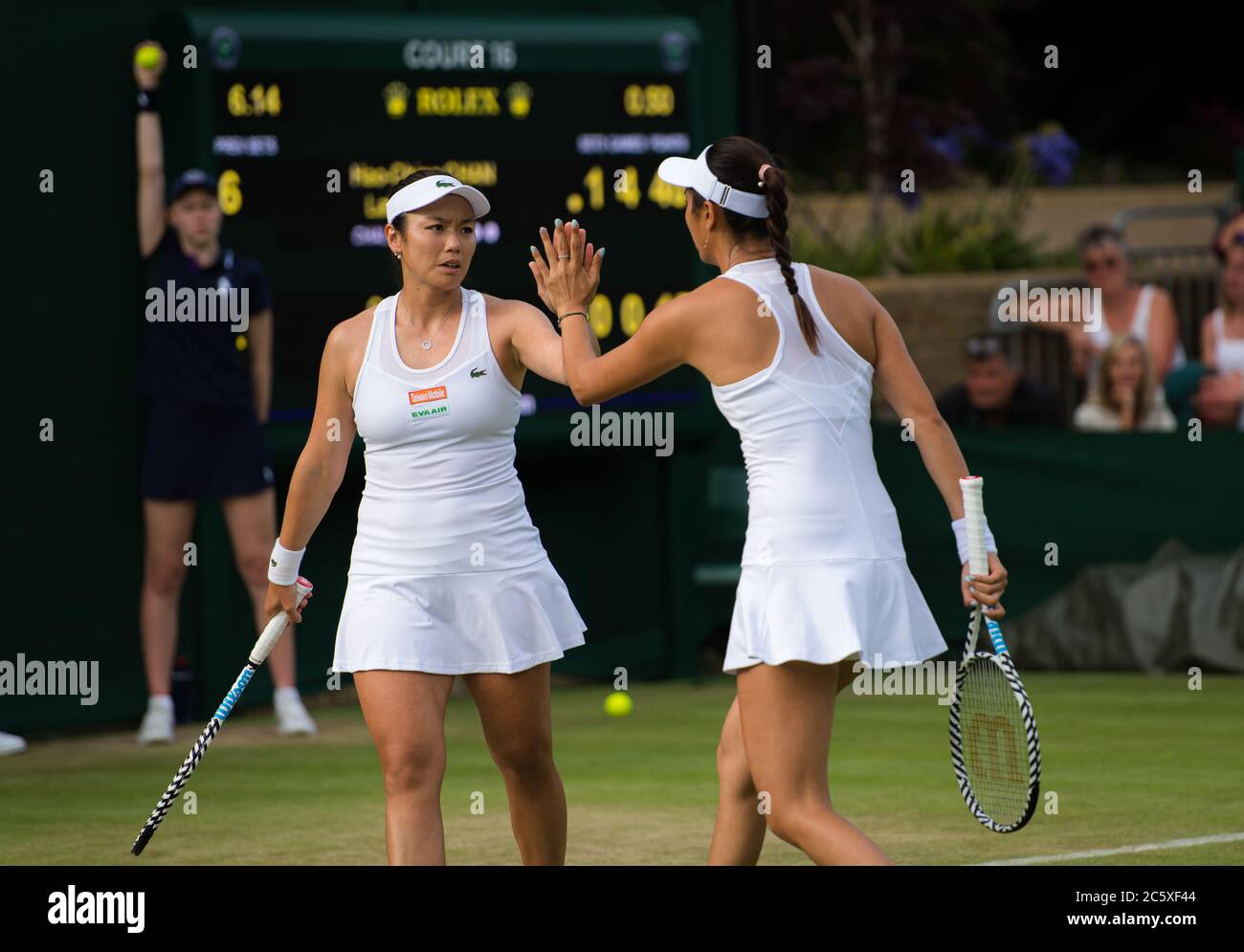 Latisha Chan & Hao-Ching Chan of Chinese Taipeh playing doubles at the 2019 Wimbledon Championships Grand Slam Tennis Tournament Stock Photo