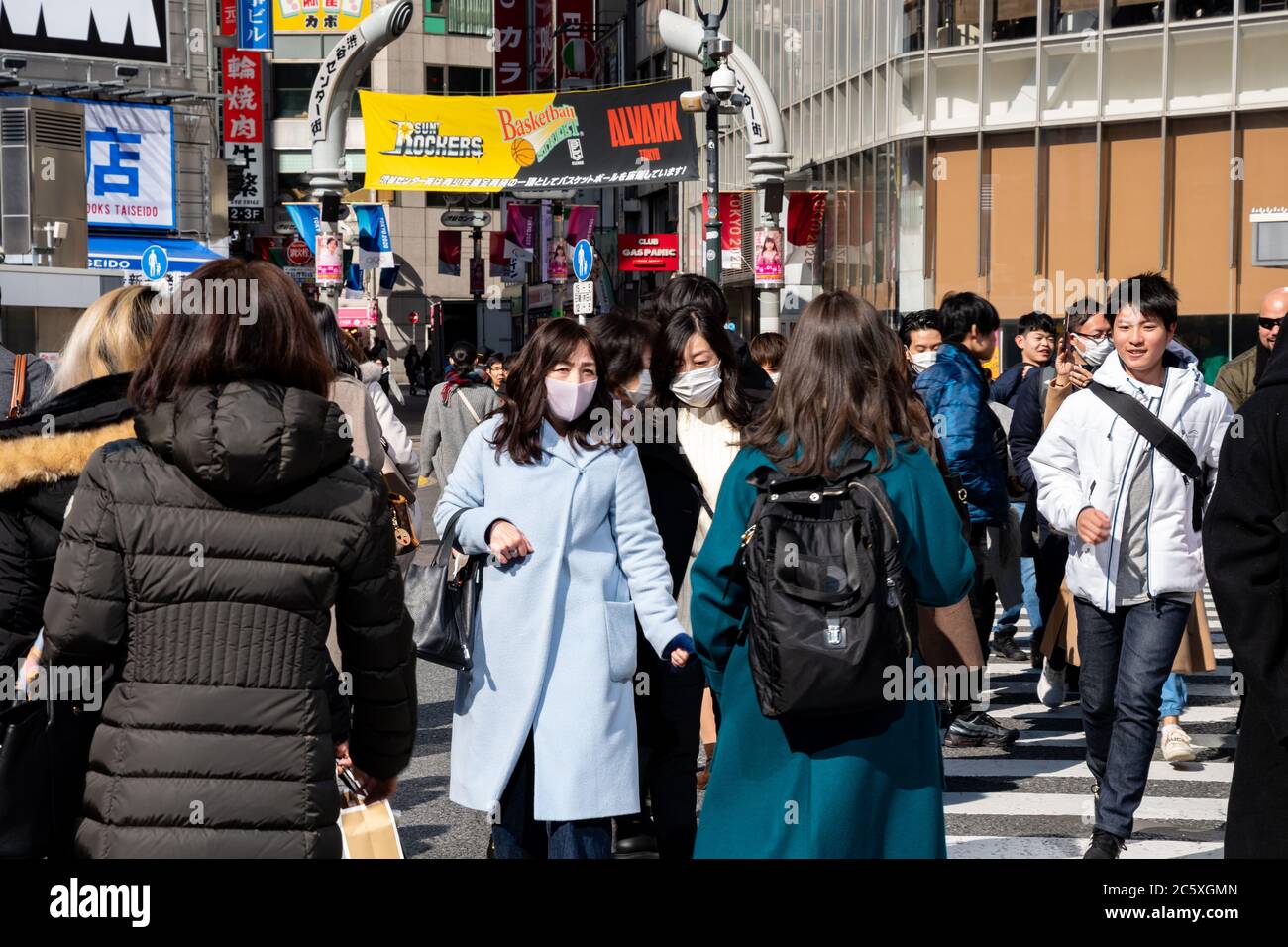 People at the popular Shibuya Scramble crossing. Tokyo, Japan Stock Photo