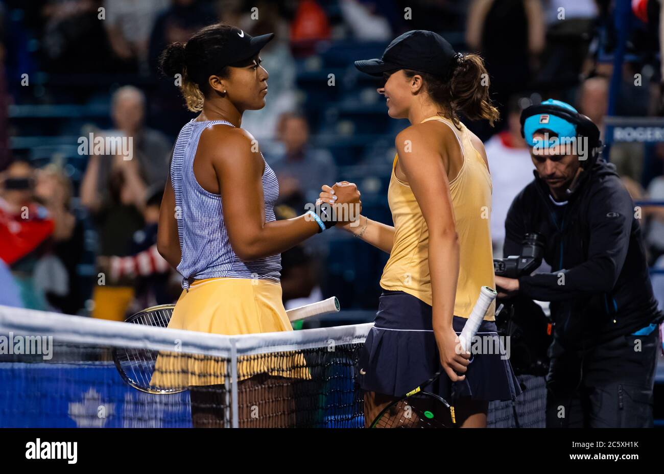 Naomi Osaka of Japan & Iga Swiatek of Poland at the net after their  third-round match at the 2019 Rogers Cup WTA Premier Tennis 5 Tournament  Stock Photo - Alamy