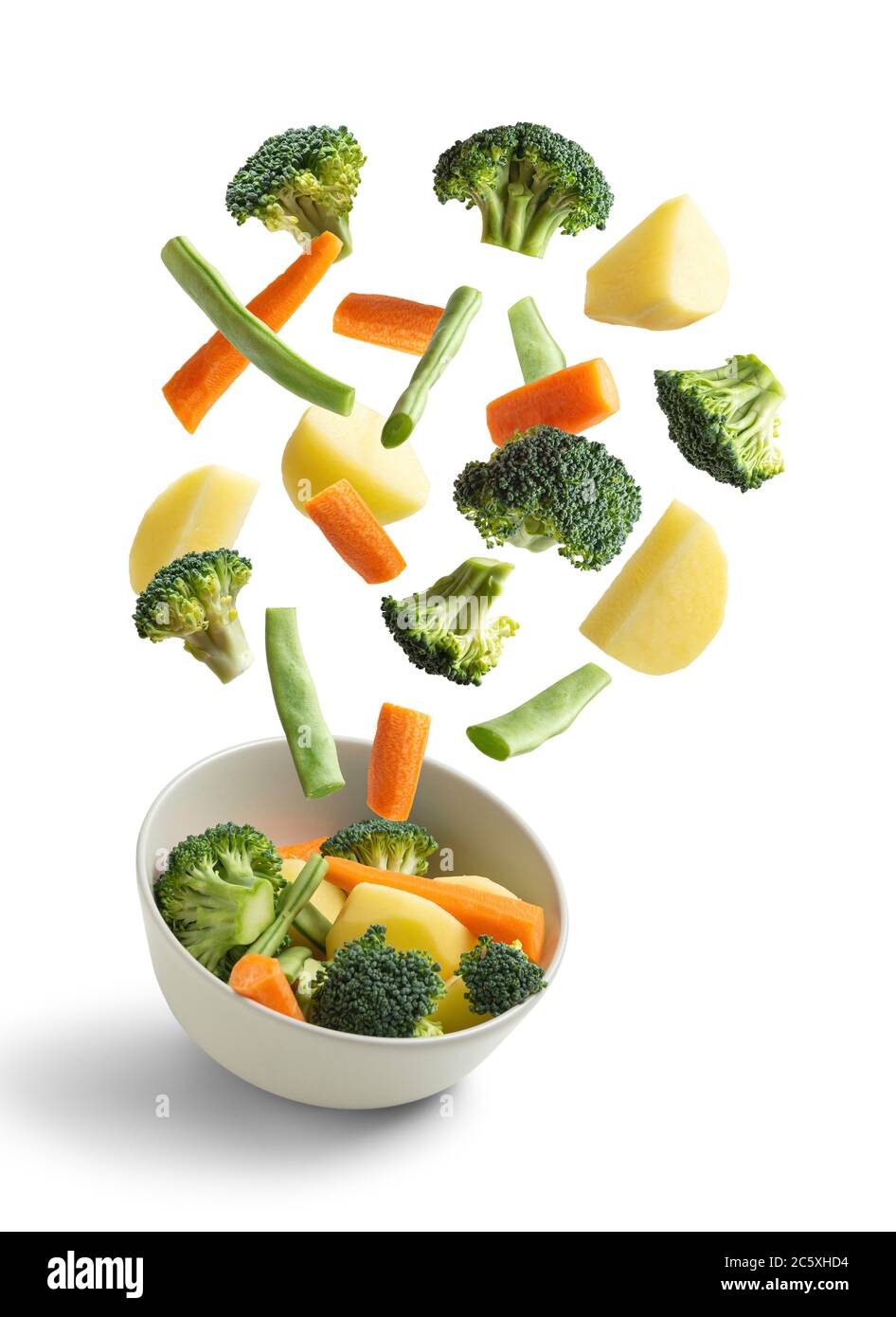 Boiled vegetables flying on white background, green bean, broccoli