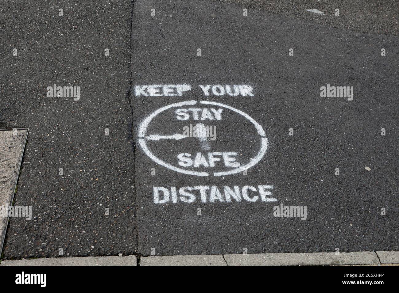 Keep your distance stay safe, pavement markings, social distancing, England UK Stock Photo