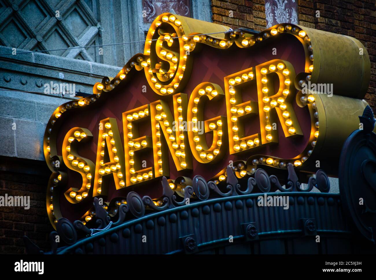 A lighted sign invites passersby to catch a show at the Saenger Theatre, July 3, 2020, in Mobile, Alabama. The theatre opened in 1927. Stock Photo