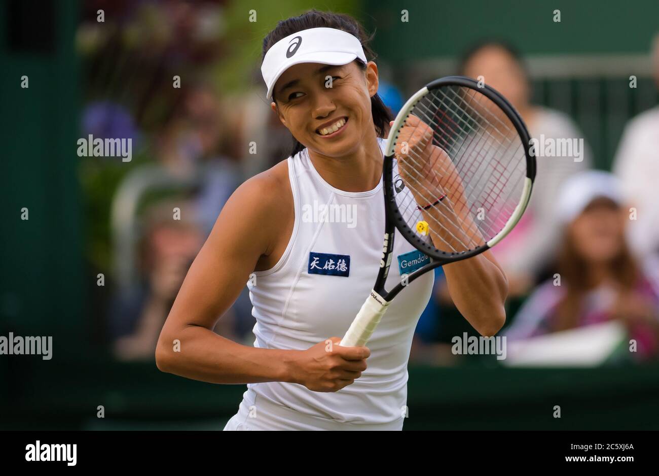 Shuai Zhang of China in action during the first round of the 2019 Wimbledon  Championships Grand Slam Tennis Tournament Stock Photo - Alamy