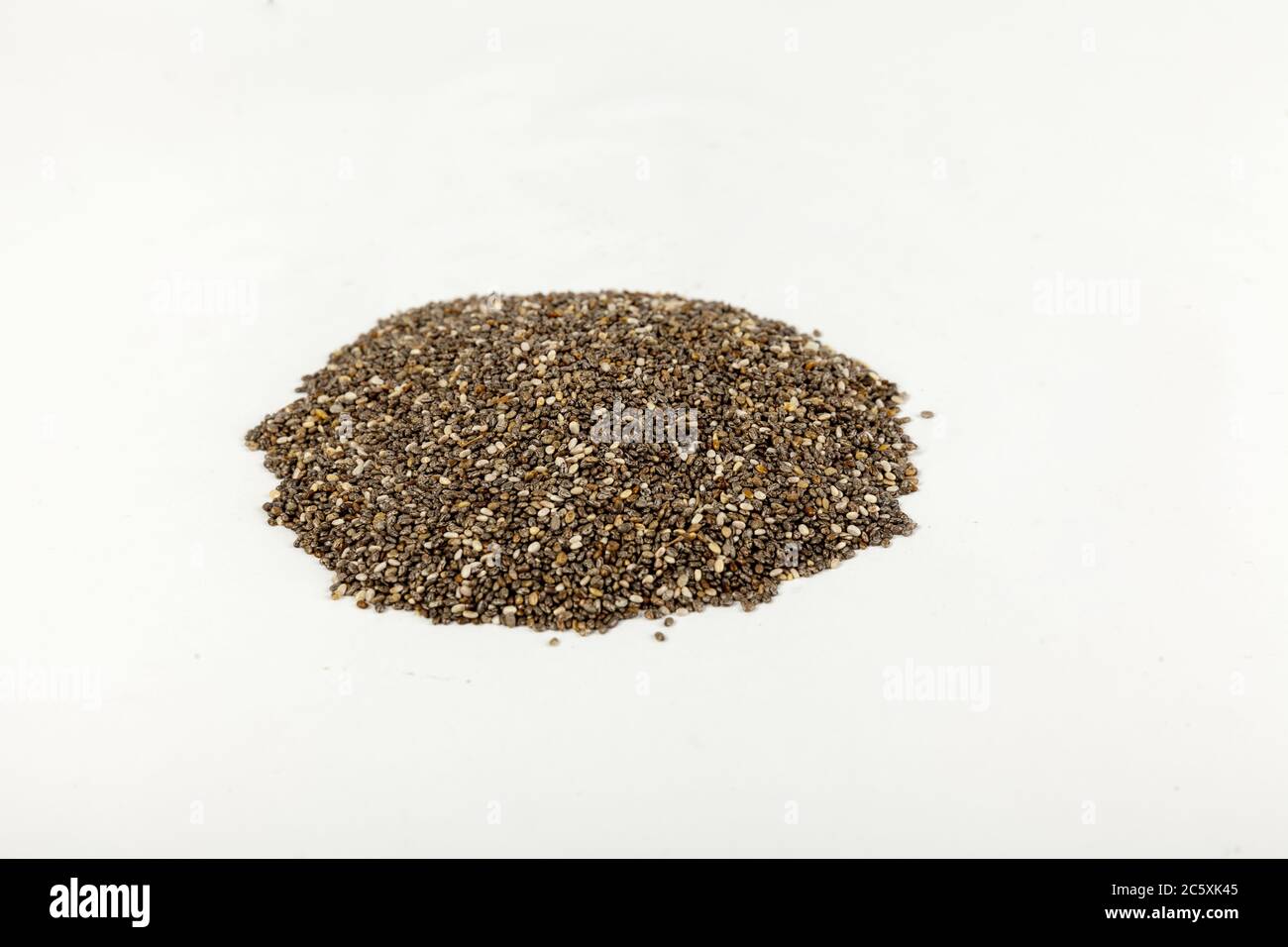 pile of chia seeds isolated on white Stock Photo