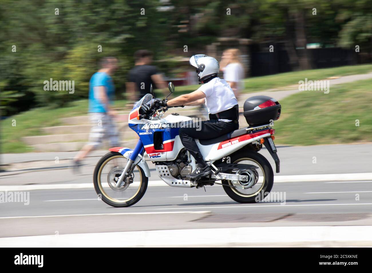 Belgrade, Serbia - July 4, 2020: Man riding fast enduro motorbike on city street on a summer day Stock Photo