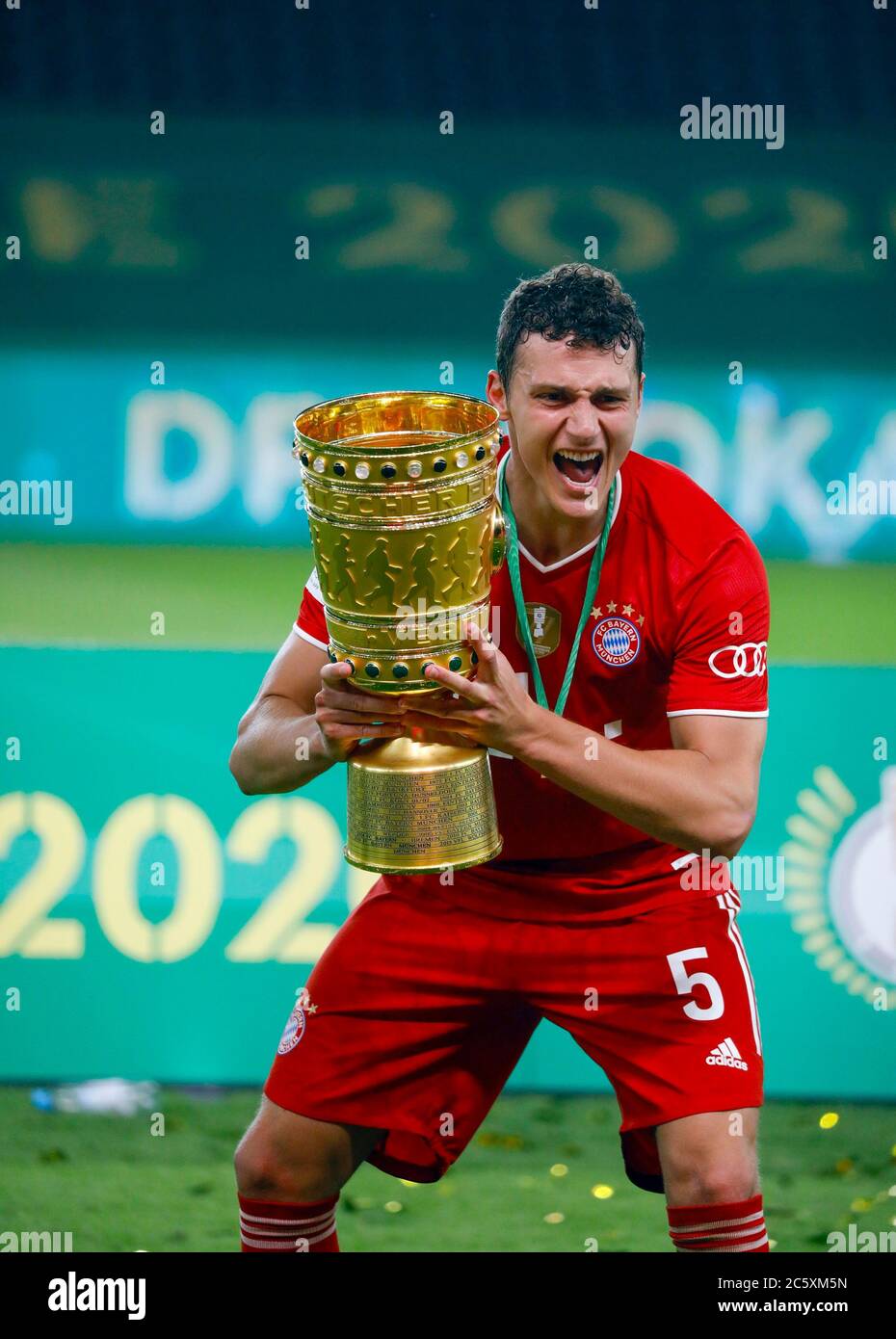 Berlin, Germany, 4 th July 2020, Celebration winner ceremony: Benjamin  PAVARD, FCB 5 with trophy, at the DFB Pokal Final match FC BAYERN MUENCHEN  - BAYER 04 LEVERKUSEN 4-2 in season 2019/2020 ,