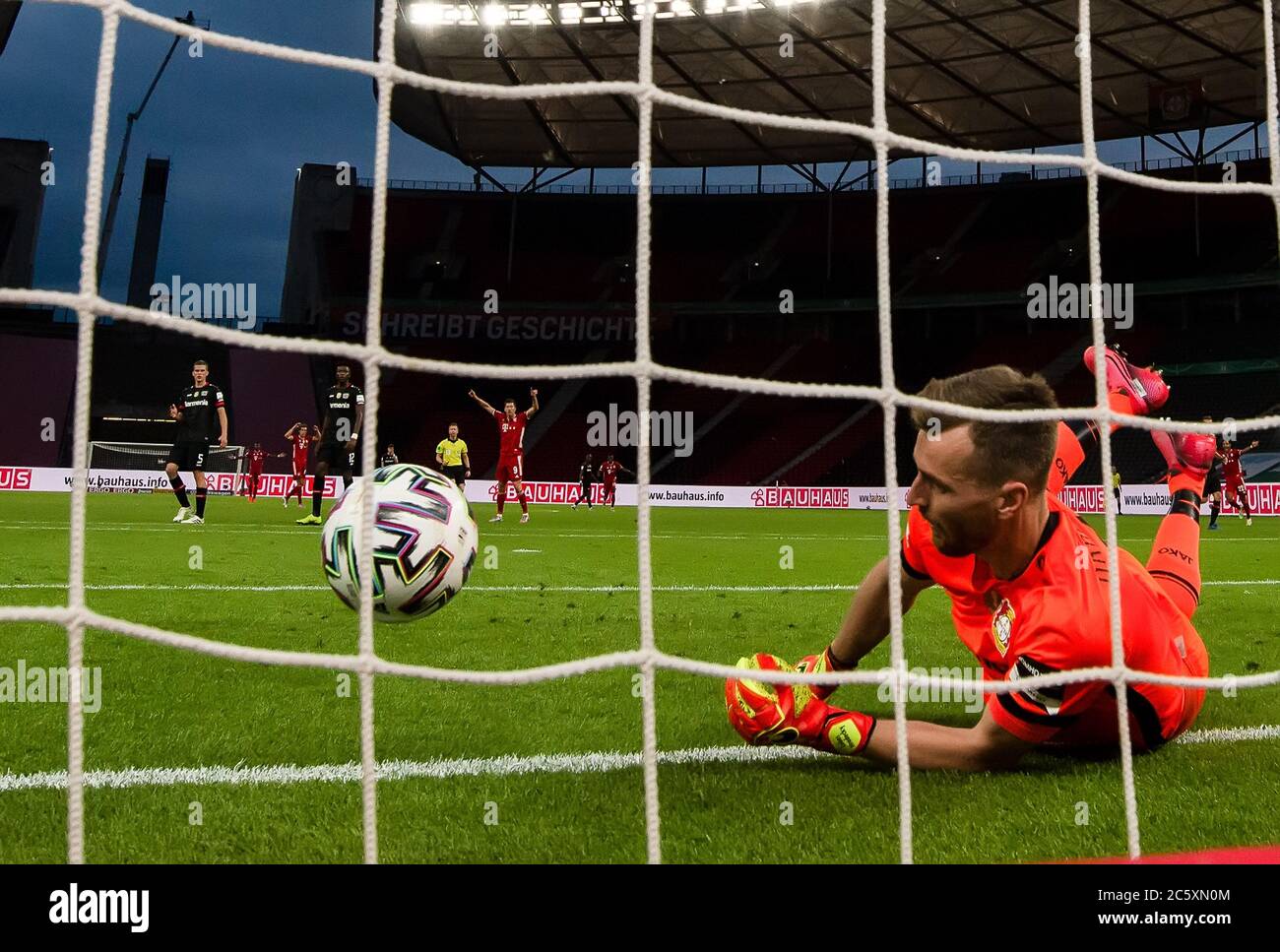 Berlin, Germany, 4 th July 2020,  Robert LEWANDOWSKI, FCB 9   scores, shoots goal for 3-0 after mistake Lukas HRADECKY, Lev 1  at the DFB Pokal Final match  FC BAYERN MUENCHEN - BAYER 04 LEVERKUSEN 4-2  in season 2019/2020 , FCB Foto: © Peter Schatz / Alamy Live News / Kevin Voigt/Jan Huebner/Pool   - DFB REGULATIONS PROHIBIT ANY USE OF PHOTOGRAPHS as IMAGE SEQUENCES and/or QUASI-VIDEO -  National and international News-Agencies OUT Editorial Use ONLY Stock Photo
