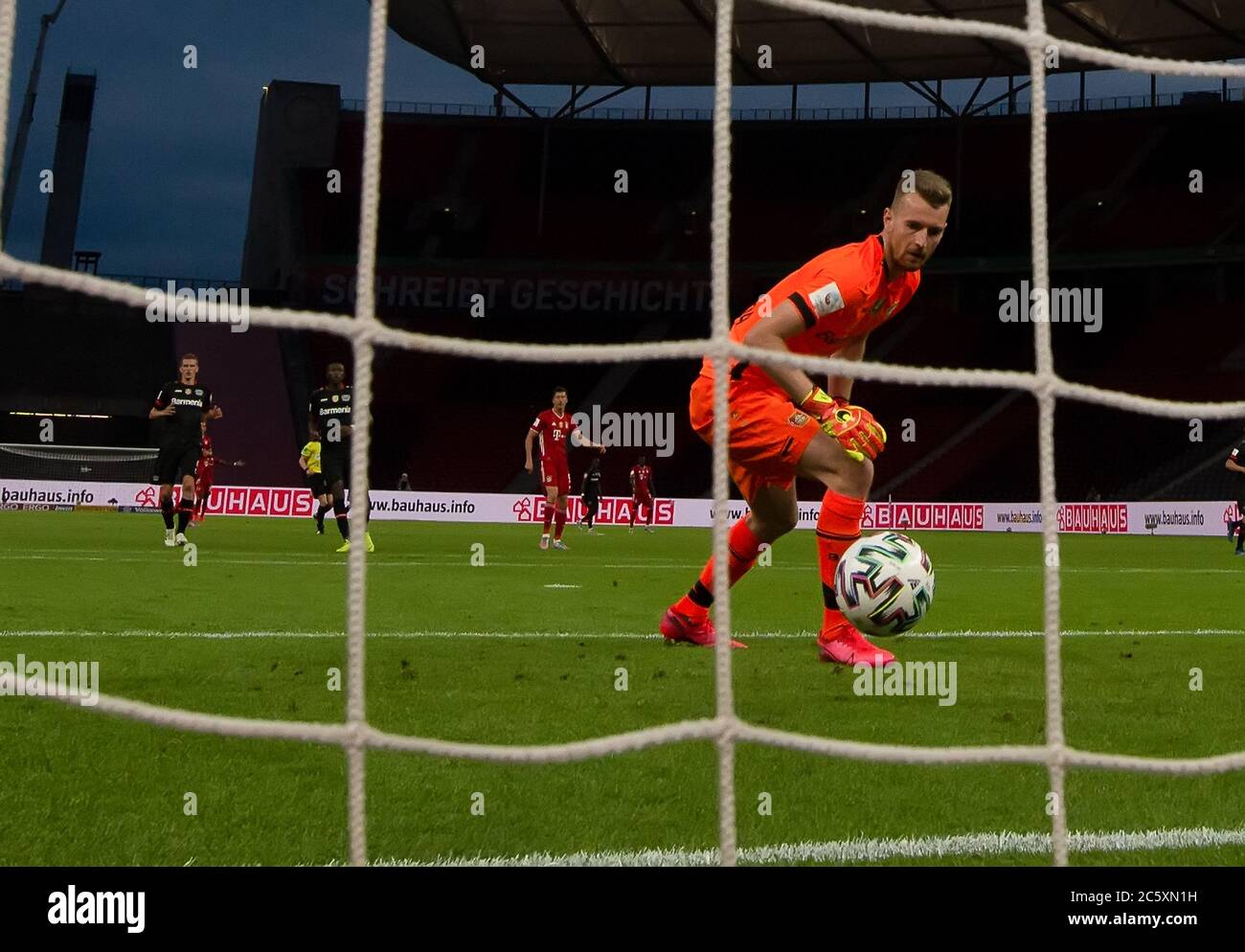 Berlin, Germany, 4 th July 2020,  Robert LEWANDOWSKI, FCB 9   scores, shoots goal for 3-0 after mistake Lukas HRADECKY, Lev 1  at the DFB Pokal Final match  FC BAYERN MUENCHEN - BAYER 04 LEVERKUSEN 4-2  in season 2019/2020 , FCB Foto: © Peter Schatz / Alamy Live News / Kevin Voigt/Jan Huebner/Pool   - DFB REGULATIONS PROHIBIT ANY USE OF PHOTOGRAPHS as IMAGE SEQUENCES and/or QUASI-VIDEO -  National and international News-Agencies OUT Editorial Use ONLY Stock Photo
